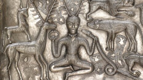 Detail of the antlered figure holding a torc and a ram-headed snake depicted on the 1st or 2nd century BC Gundestrup cauldron